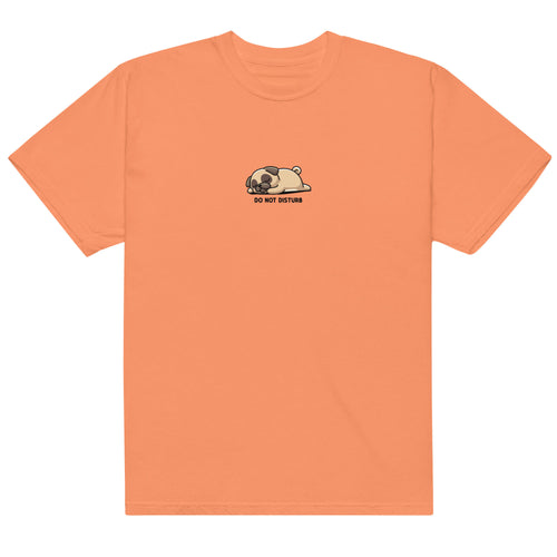 Orange t-shirt with a small graphic on the chest against a white background