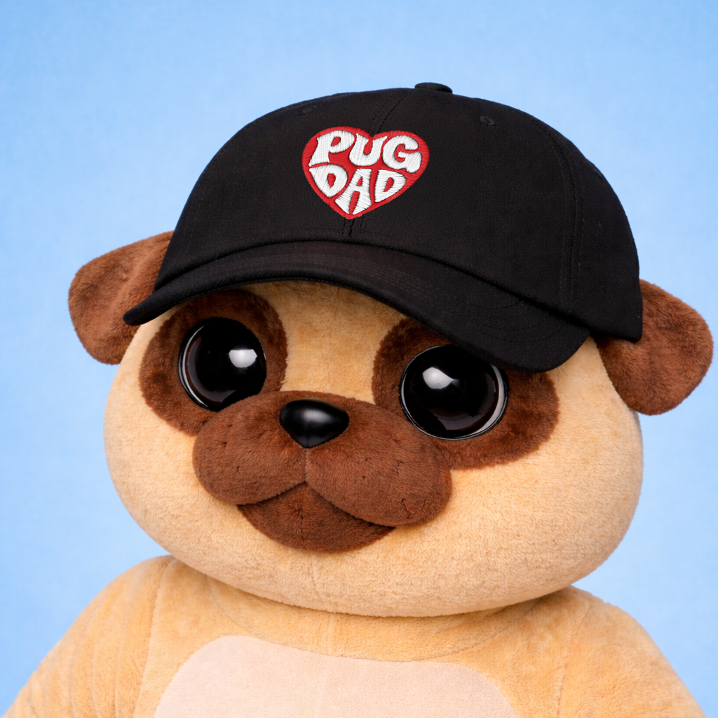 Plush dog toy wearing a black cap with 'Pug Dad' text on a blue background